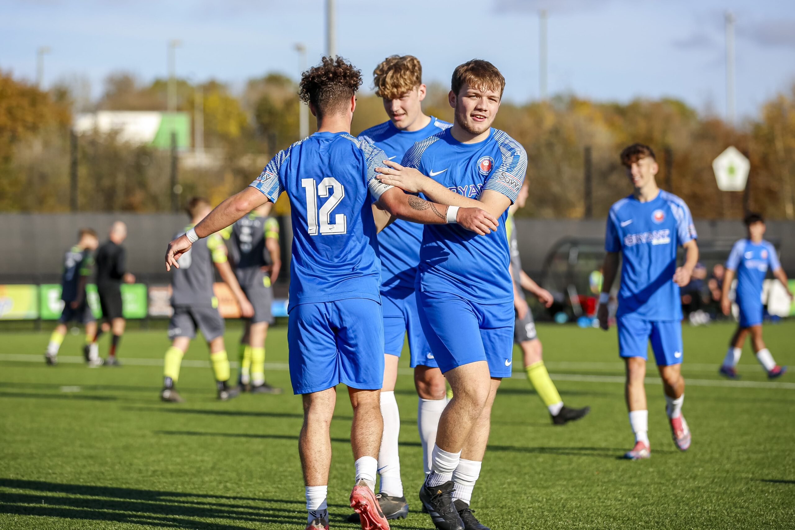 Hampshire FA Academy boys celebrating a goal.