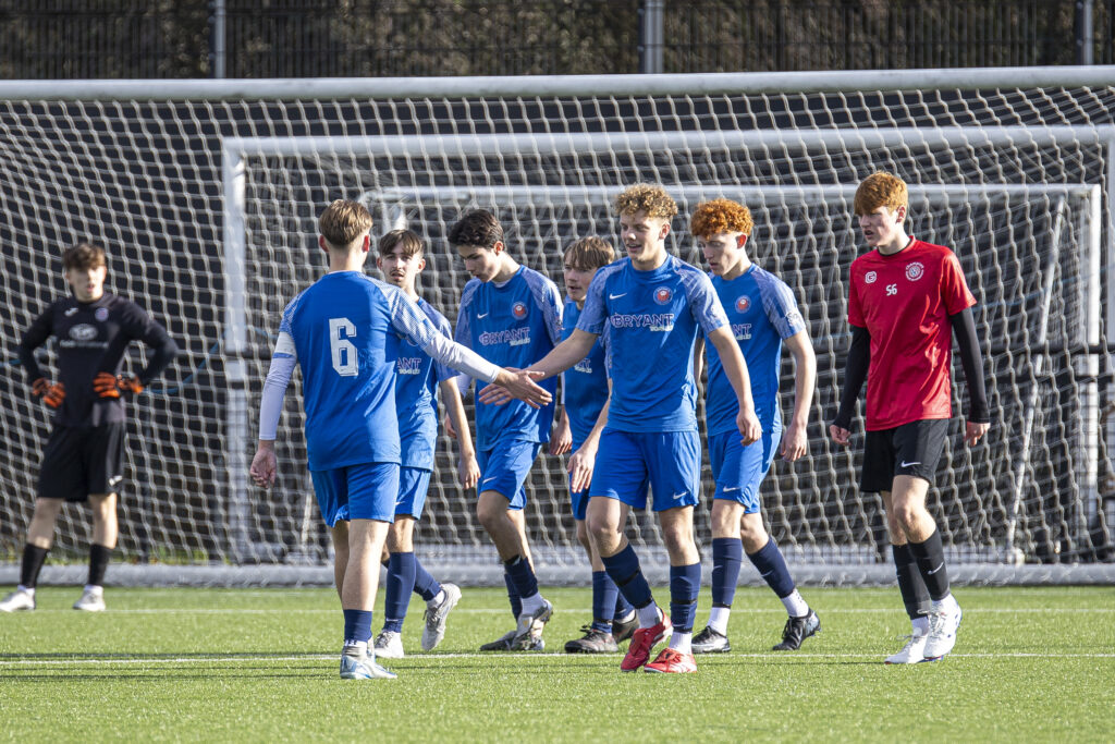 HFA Boys celebrating a goal.