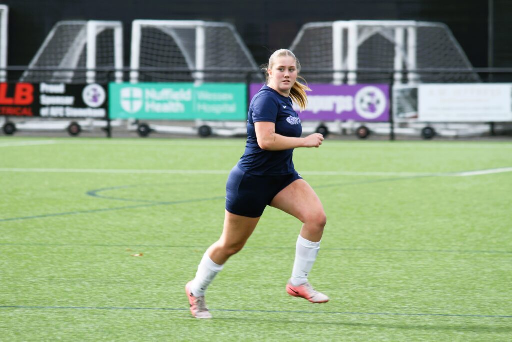 Academy player running